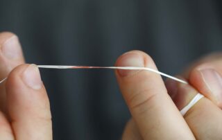 gum bleeding floss